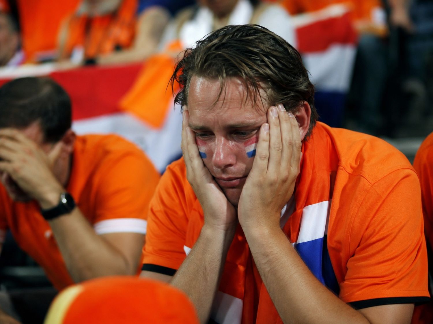 Hoe verwerk je de uitschakeling van Oranje op je werk?